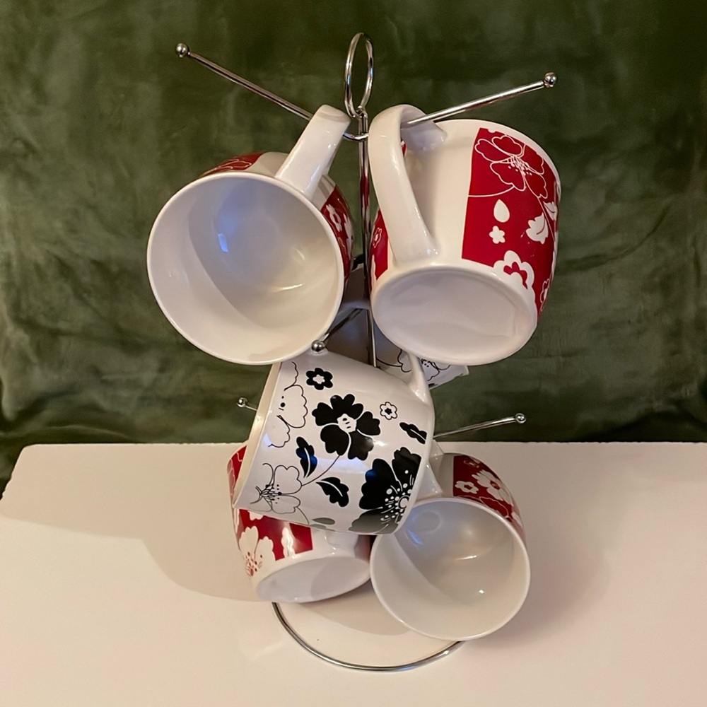 MUG SET:NIB; 7 piece floral mug set with stand.